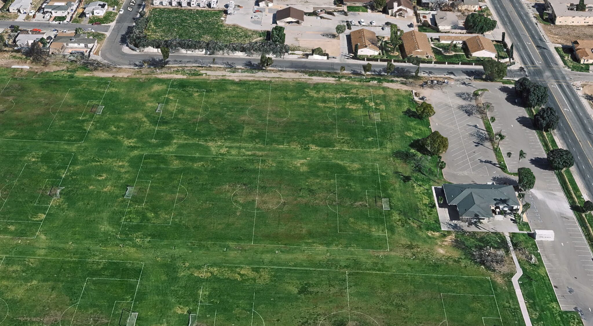Current aerial view of the San Bernardino Soccer Complex property and Pacific Street frontage